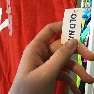 T-shirt, never worn, still has tags